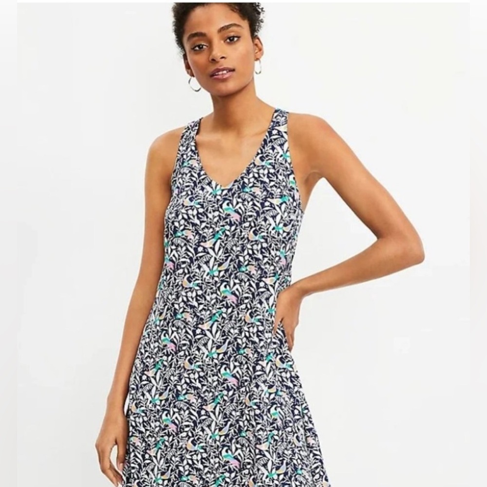 Loft sundress with whimsical bird print and crosse straps in back size xs